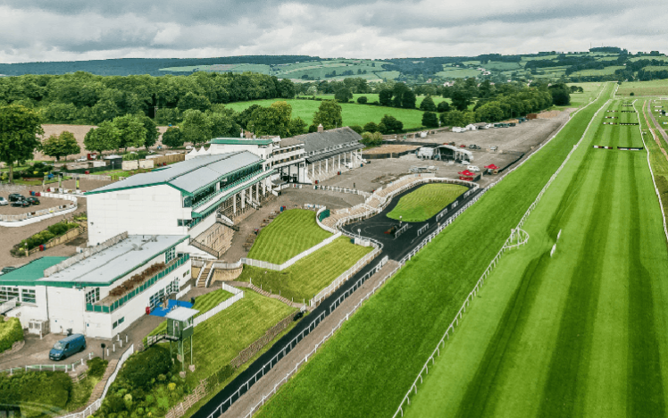 An aerial view of the grandstand and home straight at Chepstow Racecourse