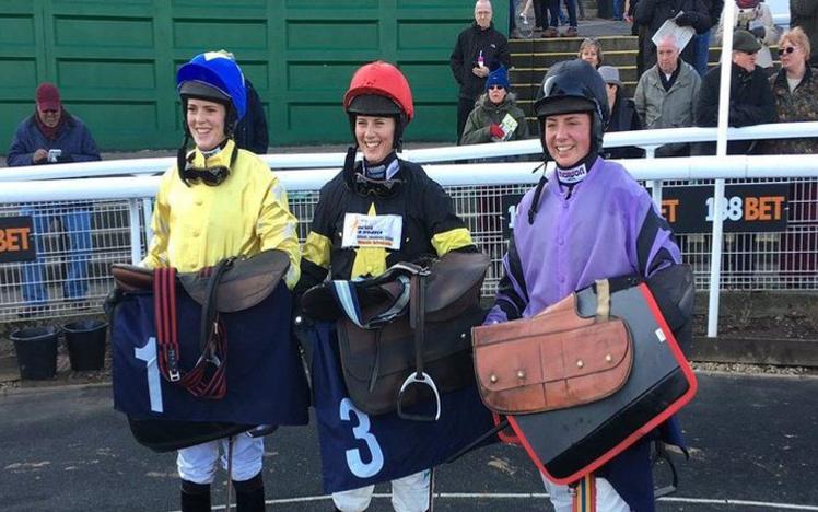 Three female Jockeys pose for Photographs at Chepstow Racecourse' Ladies Day