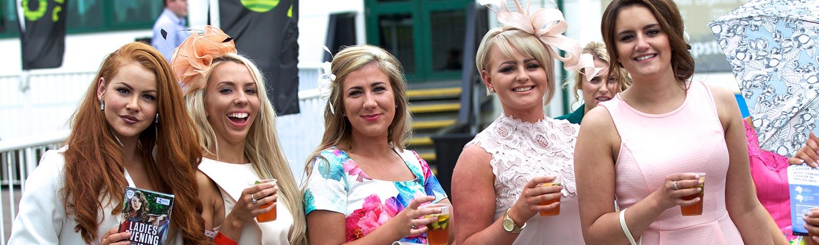 Group of ladies posing for a photo at a raceday at Chepstow Racecourse.