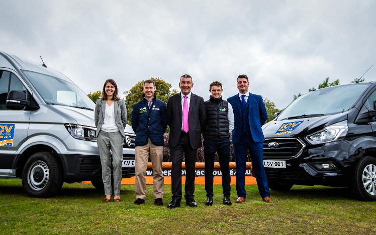 Low Cost Vans team posing for a photo with some of the team from Chepstow Racecourse.